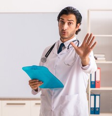 Sticker - Young doctor in front of whiteboard