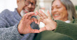 © Charlize D/peopleimages.com - Smile, heart hands or old couple with support, love or hope in a marriage commitment at home together. Happy, valentines day blur or romantic senior man with trust or elderly woman on anniversary