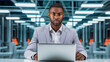 © ImageFlow - Portrait of System Engineer with Laptop Computer. Server Room Specialist, Cyber Security Concept. Data Protection Network, Ai Generative