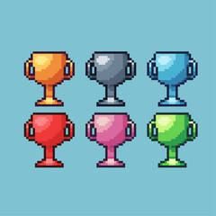 Poster - Pixel art sets of gold medal cup with variation color item asset. Simple bits of golden champion cup pixelated style. 8bits perfect for game asset or design asset element for your game design asset.