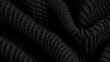  a close up shot of a black knitted fabric texture.  generative ai