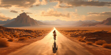 Woman Riding Bike Down Long Desert Road