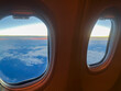 okna słońce lot samolotem krajobraz z lotu ptaka chmury