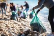 © SappiStudio - Group of people participating in a shoreline cleanup. People collect garbage. Cleaning day. Garbage in the ocean