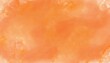 水彩で描いたオレンジ色の水彩テクスチャ背景