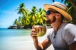 traveler sipping a coconut drink by the water