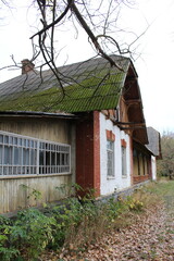 Wall Mural - A building with moss growing on the roof