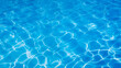 © Veeraphat - blue swimming pool abstract background With water waves, space for text.