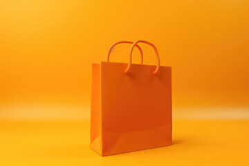 Poster - An orange shopping bag placed on a vibrant yellow background. Perfect for showcasing retail, fashion, or consumer goods.