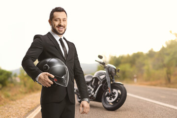 Sticker - Businessman with a chopper holding a helmet and standing on a road