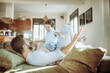 © Geber86 - Father and son enjoying playful moments in the living room