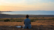 A person in a contemplative mood looking at the horizon on 