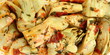 © Sanja - artichokes salad with vegetable mix sauce dressing background.