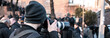 photographer hand camera in the demonstration