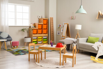 Sticker - Interior of children's playroom with toys