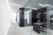 © ADDICTIVE STOCK - Modern office corridor with sleek design elements