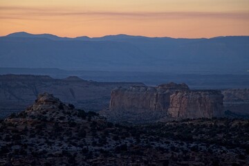 Wall Mural - Interstate 70 winds through the San Rafael Swell, a high desert region of unique landforms like mesas and buttes and pastures on top