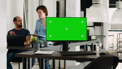 Poster - computer with blank greenscreen running in small business agency. chromakey with isolated display an