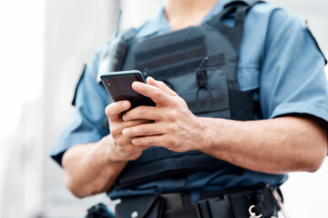 Aufkleber - Man, police and hands with phone for networking, communication or social media in the city. Closeup of male person or officer typing, texting or chatting on mobile smartphone app in an urban town