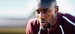 © Anela/peopleimages.com - Tired, breathing and black man in sports training, competition or game focus on rugby field, blue sky mockup. Breathe, sweating and athlete or person thinking of workout, exercise or fitness strategy