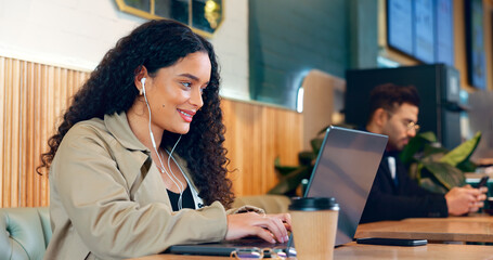 Poster - Woman, typing and laptop in coffee shop for remote work, research or networking for business with smile. Face, person and happiness with music in restaurant for copywriting, internet and freelancer