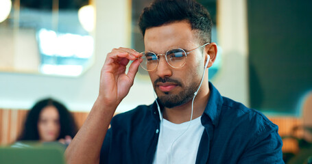 Aufkleber - Man, reading glasses and cafe for online research, remote work and review of website and analysis. Freelancer worker or designer in coffee shop or restaurant with computer and music for internet info