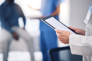 Poster - Tablet, hands and doctor with mockup in hospital for healthcare services, surgery data and working in busy clinic. Closeup, medical professional and digital technology screen for planning research