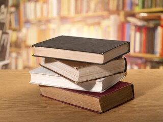 Wall Mural - Book with opened old pages in library.