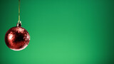 Fototapeta Kuchnia - Red Christmas Ball On Green Screen Copy Space Background