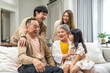 © Art_Photo - Portrait of happy love family asian father and mother playing with adorable asian kid girl.daughter, care, insurance.Happy family moments good time love with grandparents.Love of big family