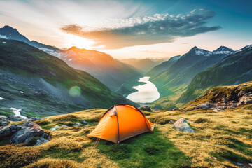 Wall Mural - Camping tent surrounded by stunning nature in the mountains with beautiful sunset in the background, nature lover, adventure camping
