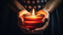 Bright Burning Candle In The Human Hands. Remembrance And Memorial Day Symbol