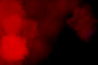 Red fog or smoke on dark copy space background. for modern advertising graphics and website illustration