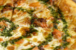 pizza with red trout fish and green sauce food and seafood