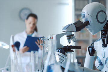 Wall Mural - scientist and robot working together in the lab