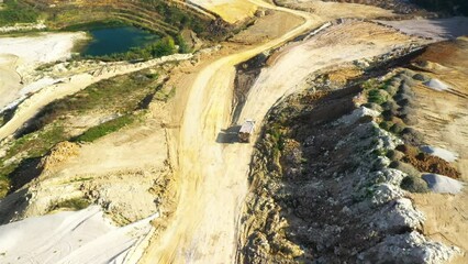 Wall Mural - Truck  working in open cast mine. Industry and transportation as a source of emissions. 