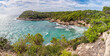 Panoramic view of Bay Cala Mitjana at south coast of Menorca (Balearic Islands)