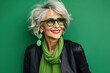 © AI_images - 60 year old fashionable hipster woman portrait on green background