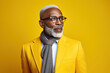 © AI_images - 60 year old fashionable hipster African American man portrait on yellow background