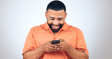 Aufkleber - Man in studio with phone, smile and typing with connection for networking, online chat or communication. Good news, notification and happy person writing message, email or post on white background.