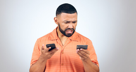 Poster - Man in studio with phone, credit card and frustrated with connection problem, debt or glitch. Fintech, anger or confused person with smartphone for banking, online shopping or 404 on white background