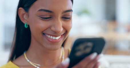 Wall Mural - Happy, Indian woman and reading social media with phone in home with funny meme, post or blog online. Internet, search and communication with cellphone to chat, contact or network with a smile