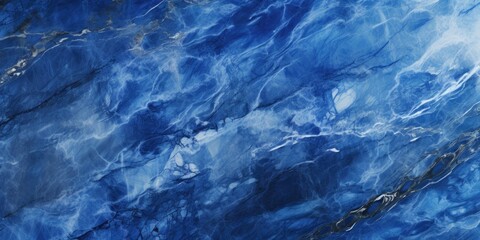Poster - A close-up view of a blue marble surface. This image can be used for various purposes.