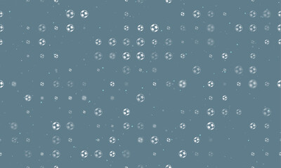 Poster - Seamless background pattern of evenly spaced white football symbols of different sizes and opacity. Vector illustration on blue grey background with stars