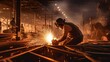 © ETAJOE - Metal welder working with arc welding at wokshop, Industrial worker is welding steel products in a factory, sparks fly