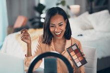 Influencer recording makeup tutorial with phone, vlogging with beauty cosmetics and streaming a skincare routine at home. Entrepreneur, female blogger or happy woman making video for social media