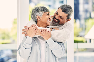 Canvas Print - Hug, marriage and senior couple with love, smile and retirement with happiness, home and bonding. Old woman, happy mature man and embrace in a lounge, loving together and romance with a relationship