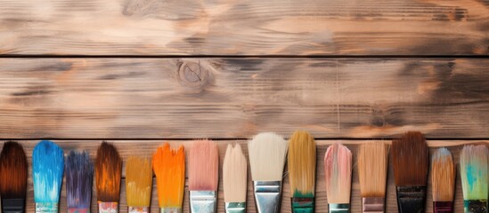 Canvas Print - wooden backdrop with painting tools