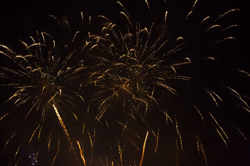 Wall Mural - beautiful holiday background of golden fireworks