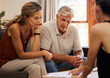 © Nina L/peopleimages.com - Finance, savings and investment with a senior couple in a meeting with an advisor for retirement in their home. Money, growth and accounting with a male and female pensioner talking with a banker